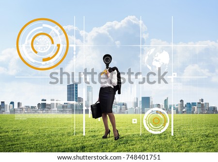 Elegant businesswoman outdoors with camera instead of head and media interface on screen