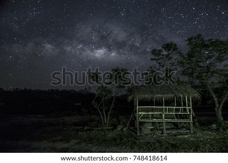 A beautiful view of the Milky Way in Kota Belud Sabah Borneo. Image contain soft focus and blur due to wide aperture and long exposure. image also contain grains and noise due to high ISO.