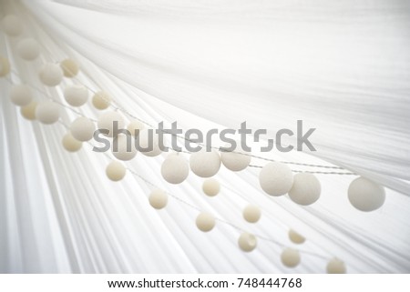 white balls cotton background new year celebration Royalty-Free Stock Photo #748444768