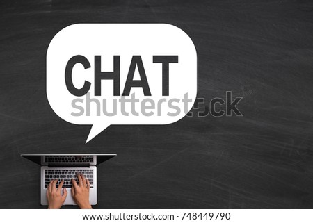 Chat speech bubble with hand playing laptop on the blackboard.