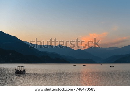Lake and mountain landscape in sunset, Pokhara