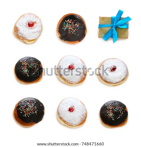 jewish holiday Hanukkah image with traditional doughnuts isolated on white