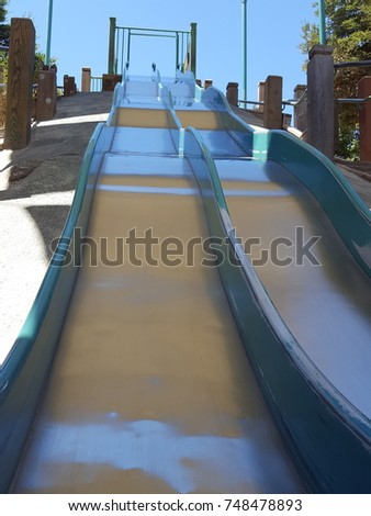 Giant bumpy metal slide. Royalty-Free Stock Photo #748478893