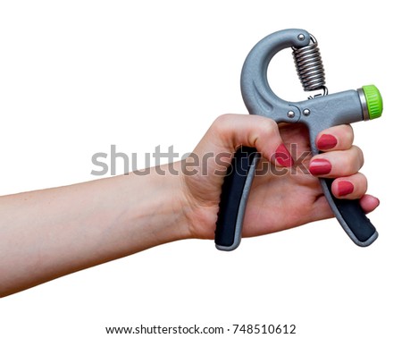 Woman's hand with hand expander (hand gripper). Hand grip strengthening tool. Expander with spring. Training with expander makes your hands stronger. Sport, equipment, healthcare. Isolated on white.