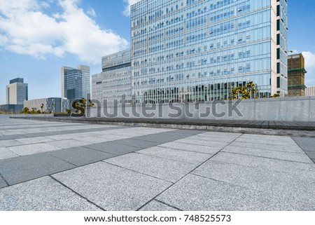 empty brick floor with cityscape and skyline
