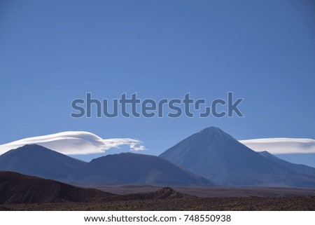 Mountain with clouds. Royalty-Free Stock Photo #748550938