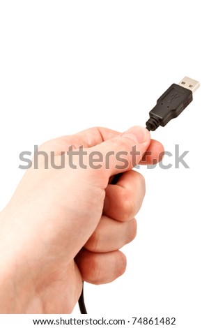 Closeup of hand holding USB cable. Isolated on white background