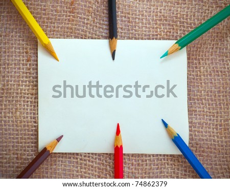 Blank card with different pencils