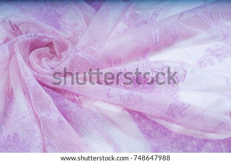 texture, pattern. the fabric is lacy pale pink. lacy pink brocade, embodying elegance. Paste it in complex tops, designs, and much more. Light with a soft hand.