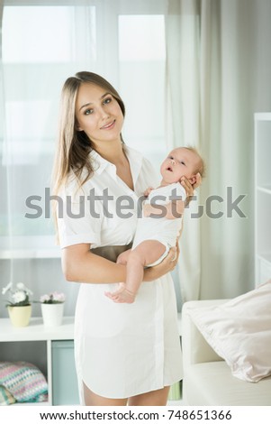 Mom with a newborn baby two months old