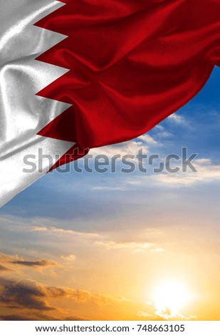 Grunge colorful flag Bahrain, with copyspace for your text or images against the background of the sunset sky