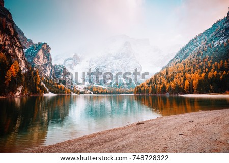 Scenic image of alpine lake Braies (Pragser Wildsee). Location place Dolomiti national park Fanes-Sennes-Braies, Italy, Europe. Great picture of wild. Explore the beauty of earth. Tourism concept. 