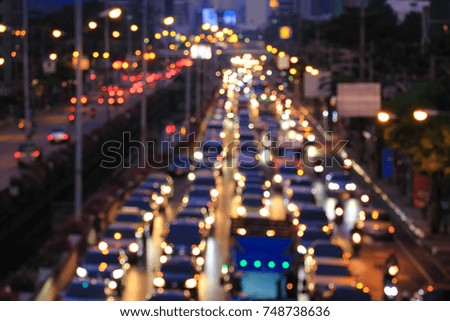 Cars in the movement and abstract bokeh city light background
