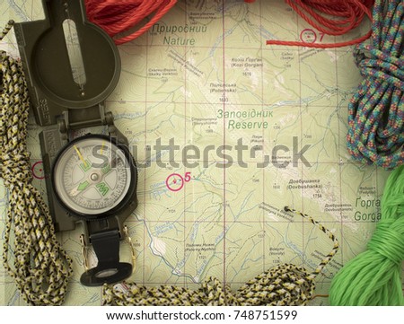 Map with compass and ropes. Simple navigation tools to orient in the world. Map of Gorgany (Carpathian Mountains)