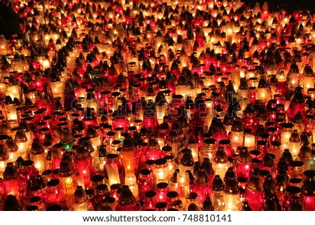 Cemetery candles in a Catholic Church at All Saints' Day (Wszystkich Swietych),  an annual national holiday in Poland to celebrate the saints on November 1. A sea of candles and memories.