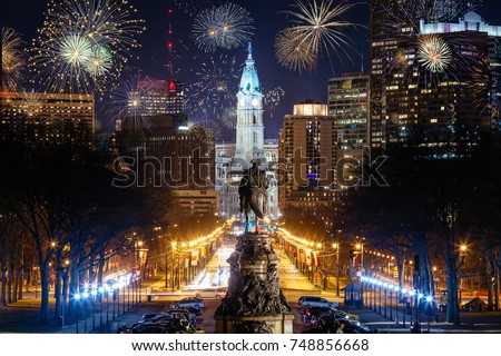 Colorful Fireworks above Philadelphia, Pensilvania, Cityscape Celebrating New Years Eve with George Washington Statue in the Middle. Pensilvania, USA. Royalty-Free Stock Photo #748856668