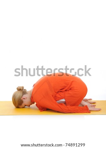 series or yoga photos. young woman relaxing in pranama pose on yellow pilated mat