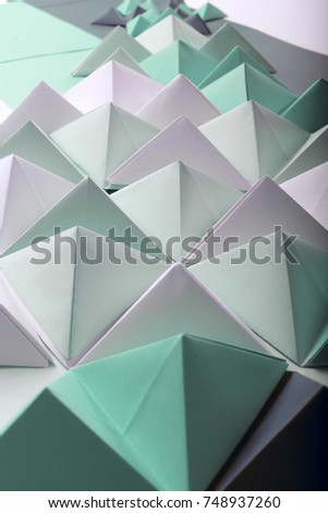 Abstract green to red paper poly made from tetrahedron background. Usefull for business cards and web.