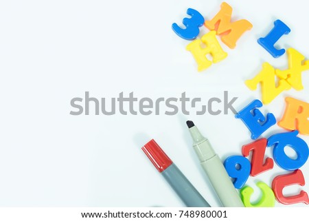 colored letters or alphabet and number on white background. Concept about education.