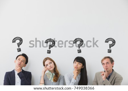 Group of people having questions. Royalty-Free Stock Photo #749038366
