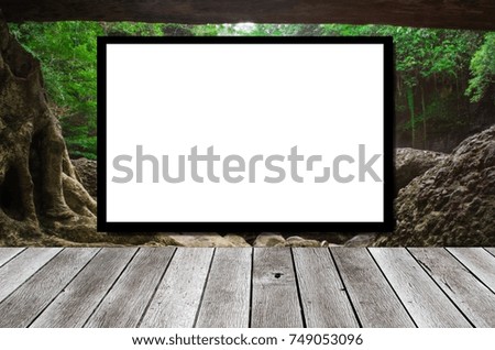 blank advertising billboard or wide screen television on nature background and wooden shelf or desk, copy space for display of product presentation, commercial and marketing concept