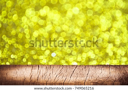 empty wooden on golden lighting backdrop. christmas light background