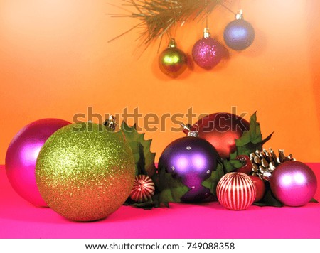 Colorful Christmas Bauble Ornaments with lens flare.