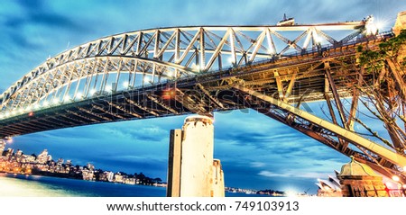 Sydney Harbour Bridge and city night skyline, Australia.