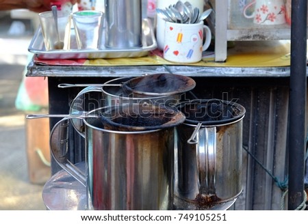 Street coffee cart in Thailand, Thai style coffee and sell cheap price. Vintage making coffee with thai style