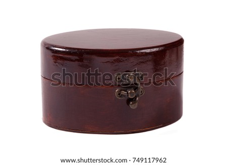 Small close wooden brown vintage box isolated on a white background.