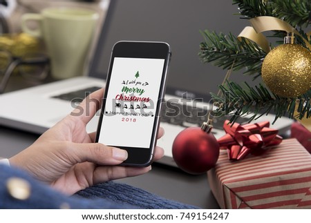 People received greeting text massage Merry Christmas from another person.