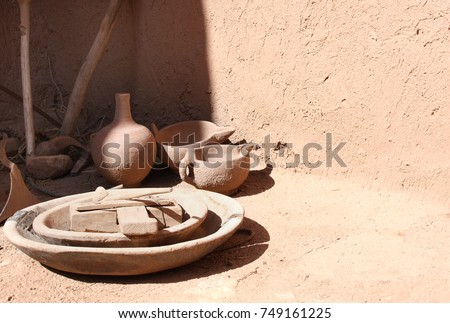 Traditional clay pottery in the Moroccan house, Kasbah Ait Ben Haddou (Ait Benhaddou), Atlas Mountains, Morocco, North Africa. UNESCO World Heritage Site Royalty-Free Stock Photo #749161225