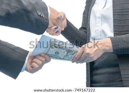 Businessmen making handshake with money under envelope isolated on white background - bribery, corruption and venality concepts