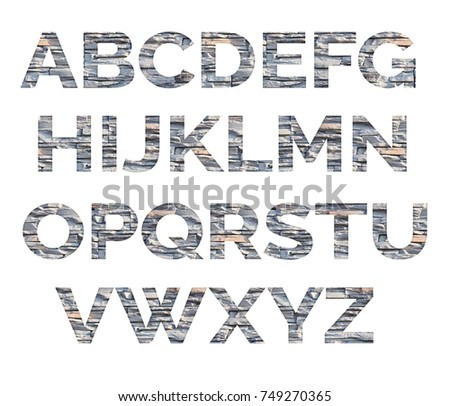 Alphabet from letters of stone. The letters are made of decorative stones