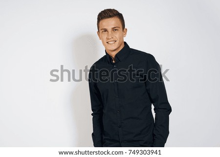 business man smiling on a light background, copy place                              