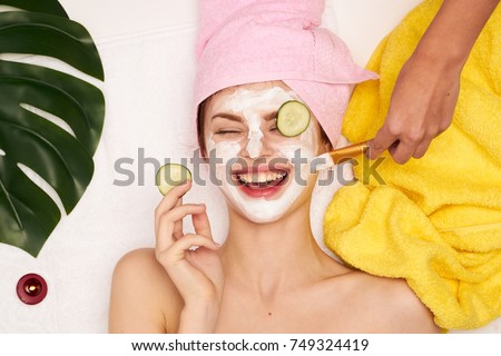 cosmetic procedures, mask for skin care, woman young, spa salon                                Royalty-Free Stock Photo #749324419