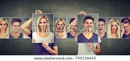 Balanced relationship concept. Masked woman and man expressing different emotions exchanging faces  Royalty-Free Stock Photo #749334643