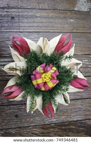 Beautiful natural material krathong of Thailand on wooden table, stock photo