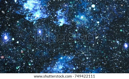 Star dust and pixie dust glitter space backdrop. Space stars and planet conceptual image.