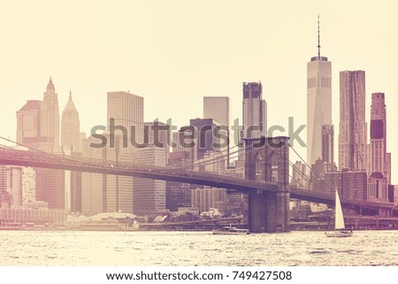 Retro stylized picture of New York City at sunset, USA.