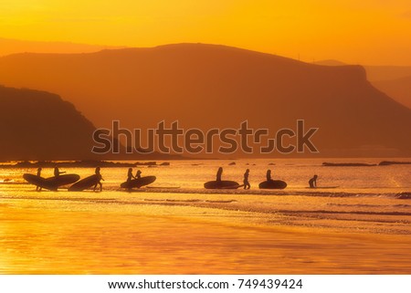 surfer girls at the sunset