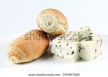 Herb Cheese and Bread Loaf Bun on white background 
 Royalty-Free Stock Photo #749487460