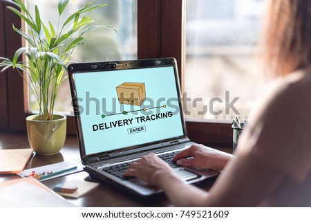 Laptop screen displaying a delivery tracking concept Royalty-Free Stock Photo #749521609