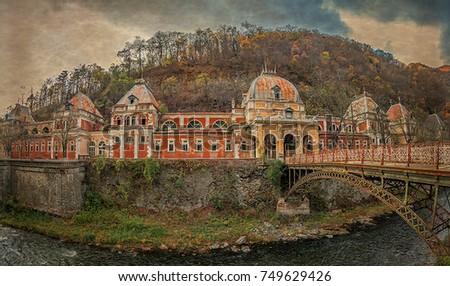 Old photo with abandoned buildings in the Romanian spa town called Herculane baths. Roman resort referred to as "Ad Aqua Herculi sacras ad Mediam". In 1736 the baths was rebuilt. Vintage processing.