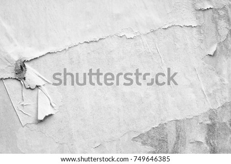 Old white posters ripped torn vintage creased crumpled paper texture background surface blank placard backdrop text space