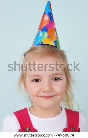 Pleasure and happiness  little girl with birthday hat