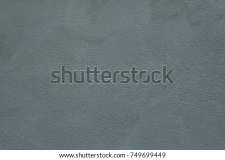 Dirty blue painted stucco wall. Background texture.