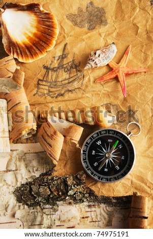 Antique map, shell, starfish and compass