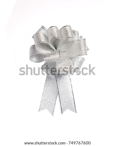Top view closeup photo image of luxury silver color silk bow isolated on white background, gift box wrapping, special occasion