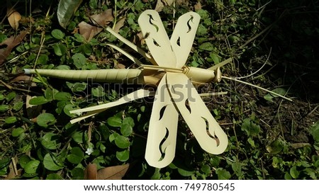 Toy made from sugar palm leaf Royalty-Free Stock Photo #749780545